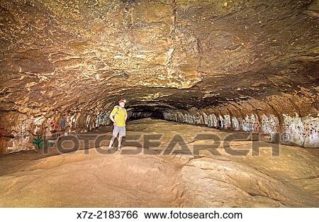exploring the Clay Cave below the high desert near the city of Eden in southern Idaho. View Large Photo Image Stock Photograph - exploring the Clay Cave below the high desert near the city of Eden in southern Idaho.. Fotosearch