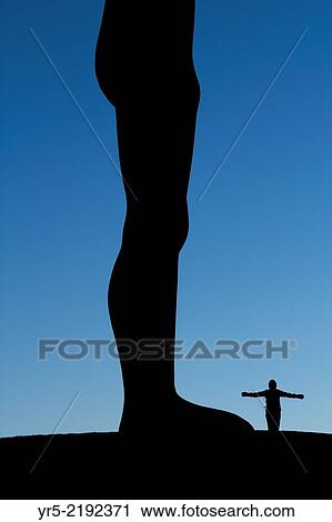 Female Spanish tourist at base of Angel of the North sculpture at sunrise on a Winter morning. Gateshead, England, United Kingdom. View Large Photo Image Stock Image - Female Spanish tourist at base of Angel of the North sculpture at sunrise on a Winter morning. Gateshead, England, United Kingdom.. Fotosearch