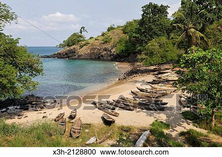 fisherman´s pirogues on a beach of the north coast of Sao Tome Island, Republic of Sao Tome and Principe, Africa. View Large Photo Image Stock Image - fisherman´s pirogues on a beach of the north coast of Sao Tome Island, Republic of Sao Tome and Principe, Africa.. Fotosearch