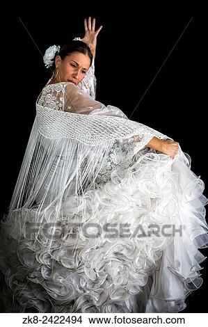 Flamenco dancer backs with white dress and hands crossed up on black background. View Large Photo Image Picture - Flamenco dancer backs with white dress and hands crossed up on black background.. Fotosearch