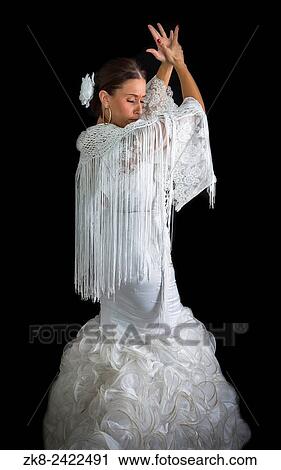 Flamenco dancer dressed in white with expression of feeling passionate in black background. View Large Photo Image Stock Image - Flamenco dancer dressed in white with expression of feeling passionate in black background.. Fotosearch