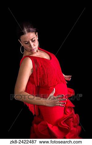 Flamenco dancer with expression of feeling passionate in black background. View Large Photo Image Stock Photo - Flamenco dancer with expression of feeling passionate in black background.. Fotosearch