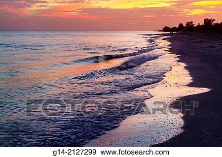Florida, Sanibel Island, Gulf of Mexico, beach, sunset, dusk, water, surf, sky, clouds,. View Large Photo Image Stock Photo - Florida, Sanibel Island, Gulf of Mexico, beach, sunset, dusk, water, surf, sky, clouds,.. Fotosearch