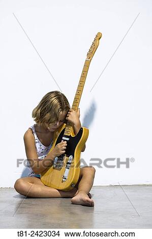 girl playing electric guitar telecaster, studio in Valencia, Spain View Large Photo Image Picture - girl playing electric guitar telecaster, studio in Valencia, Spain. Fotosearch
