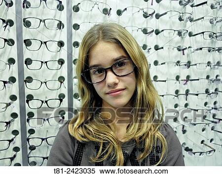 girl with glasses in a shop in Paris, France View Large Photo Image Stock Photography - girl with glasses in a shop in Paris, France. Fotosearch