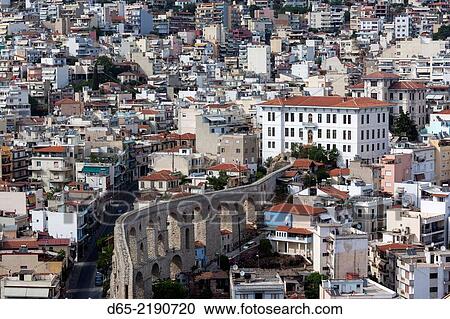 Greece, East Macedonia and Thrace Region, Kavala, elevated city view with the Kamares Aqueduct, built in 1530 by Suleiman the Magnificent, late afternoon. View Large Photo Image Stock Image - Greece, East Macedonia and Thrace Region, Kavala, elevated city view with the Kamares Aqueduct, built in 1530 by Suleiman the Magnificent, late afternoon.. Fotosearch