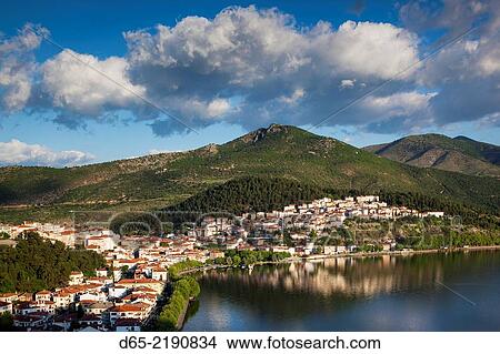 Picture - Greece, West Macedonia Region, Kastoria, elevated town view by Lake Orestiada from Agia Sotira church, dawn.. Fotosearch