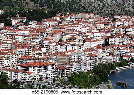 Greece, West Macedonia Region, Kastoria, elevated town view by Lake Orestiada. View Large Photo Image Stock Photography - Greece, West Macedonia Region, Kastoria, elevated town view by Lake Orestiada.. Fotosearch