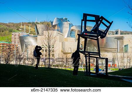 Stock Photography - Guggenheim Museum and Chaos Nervion sculpture. Bilbao, Spain.. Fotosearch
