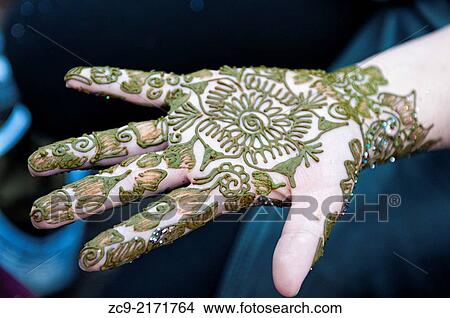 Henna tatoo on a hand in Djemaa el Fna square, Marrakech, Morocco. View Large Photo Image Picture - Henna tatoo on a hand in Djemaa el Fna square, Marrakech, Morocco.. Fotosearch
