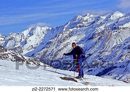 Stock Image - Hiker on snowshoes. Aragonese Pyrenees, Huesca province, Spain. Fotosearch