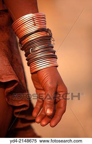 Himba, with the typical ornaments, Kaokoland, Kunene region, Namibia. View Large Photo Image Stock Photography - Himba, with the typical ornaments, Kaokoland, Kunene region, Namibia.. Fotosearch