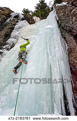 ice climbing a route called Hang Over which is rated WI-3 and located in Hyalite Canyon in the Gallatin Mountains near the city of Bozeman in southern Montana. View Large Photo Image Stock Image - ice climbing a route called Hang Over which is rated WI-3 and located in Hyalite Canyon in the Gallatin Mountains near the city of Bozeman in southern Montana.. Fotosearch
