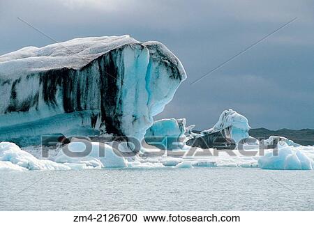 ICELAND, SOUTH COAST, VATNAJOKULL, GLACIER LAGOON WITH ICEBERGS. View Large Photo Image Stock Image - ICELAND, SOUTH COAST, VATNAJOKULL, GLACIER LAGOON WITH ICEBERGS.. Fotosearch