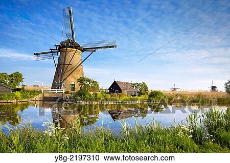 Kinderdijk windmills - Holland Netherlands. View Large Photo Image Stock Image - Kinderdijk windmills - Holland Netherlands.. Fotosearch