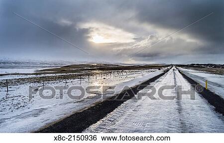 Landscape in Skagafjoerdur during winter. Road condition during winter in Iceland. Country road covered by a layer of pure ice. europe, northern europe, iceland, February. View Large Photo Image Stock Photograph - Landscape in Skagafjoerdur during winter. Road condition during winter in Iceland. Country road covered by a layer of pure ice. europe, northern europe, iceland, February.. Fotosearch