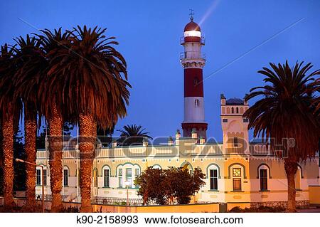 Lighthouse of Swakopmund with palm trees and the old court building, Namibia, Africa. View Large Photo Image Stock Image - Lighthouse of Swakopmund with palm trees and the old court building, Namibia, Africa.. Fotosearch