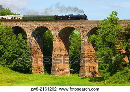Stock Image - LNER Class K4 2-6-0 Â´The Great MarquessÂ´ SSteam train passing over Dry Beck Viaduct near Armathwaite Settle to Carlisle Railway Line, Eden Valley, Cumbria, England, UK.. Fotosearch