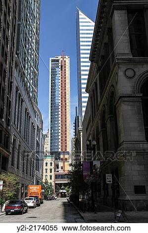 Looking down a steet towards a downtown skyscraper, Chicago, Illinois. View Large Photo Image Stock Photography - Looking down a steet towards a downtown skyscraper, Chicago, Illinois.. Fotosearch