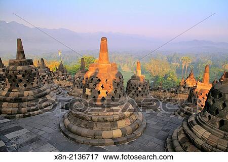 Mahayana Buddhist Temple (8th century), Borobudur, near Magelang, Central Java, Indonesia. View Large Photo Image Stock Photo - Mahayana Buddhist Temple (8th century), Borobudur, near Magelang, Central Java, Indonesia.. Fotosearch