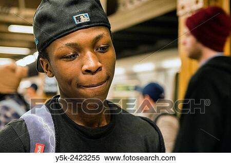Manhattan, New York City, New York. Portrait of an young African American male in an underground View Large Photo Image Stock Photography - Manhattan, New York City, New York. Portrait of an young African American male in an underground. Fotosearch