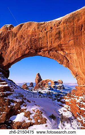 Morning light on North Window framing Turret Arch in winter, Arches National Park, Utah USA. View Large Photo Image Stock Photography - Morning light on North Window framing Turret Arch in winter, Arches National Park, Utah USA.. Fotosearch