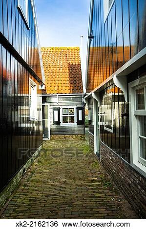 Narrow street in Marken, Nederland View Large Photo Image Stock Photograph - Narrow street in Marken, Nederland. Fotosearch
