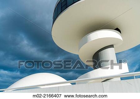 Niemeyer Center building, in Aviles, Spain, The cultural center was designed by Brazilian architect Oscar Niemeyer, was his only work in Spain. Aviles, Spain. View Large Photo Image Stock Photo - Niemeyer Center building, in Aviles, Spain, The cultural center was designed by Brazilian architect Oscar Niemeyer, was his only work in Spain. Aviles, Spain.. Fotosearch