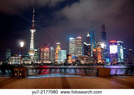 Stock Image - night view on Pudong skyline seen from the Bund, Shanghai, China.. Fotosearch