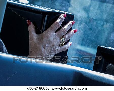 old lady hand with painted nails on a bus, Valencia, Spain View Large Photo Image Stock Image - old lady hand with painted nails on a bus, Valencia, Spain. Fotosearch