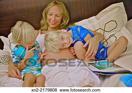 Pregnant woman with her two young sons. View Large Photo Image Stock Photo - Pregnant woman with her two young sons.. Fotosearch