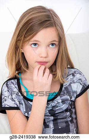 pretty girl with a thoughtful expression View Large Photo Image Stock Photo - pretty girl with a thoughtful expression. Fotosearch