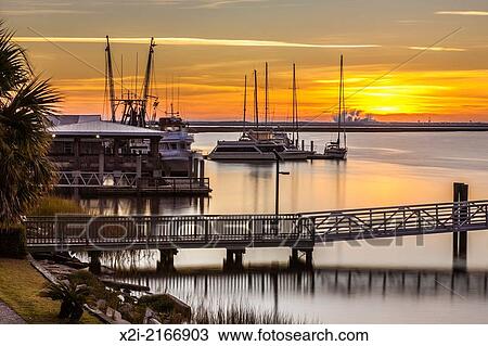 Stock Image - Private and commercial boats at LangÂ´s Marina on the waterfront in St. Marys, Georgia.. Fotosearch