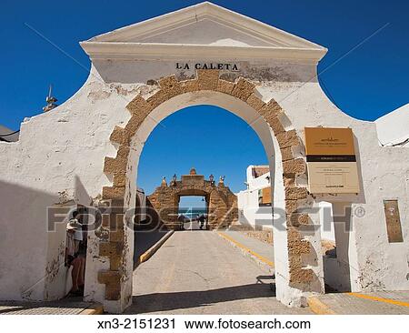Puerta de la Caleta, entrance to the promenade to the Castle of San Sebastián, Castillo de San Sebastián, Atlantic Ocean, Cádiz City, Costa de la Luz, Province of Cádiz, Andalusia, Spain View Large Photo Image Stock Image - Puerta de la Caleta, entrance to the promenade to the Castle of San Sebastián, Castillo de San Sebastián, Atlantic Ocean, Cádiz City, Costa de la Luz, Province of Cádiz, Andalusia, Spain. Fotosearch
