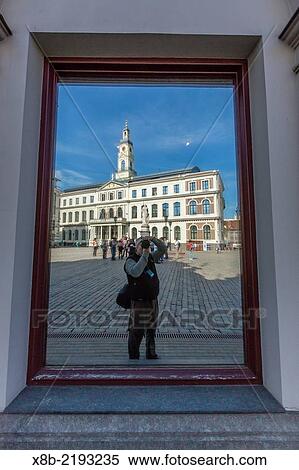 Reflections of downtown in shop window, Riga, Latvia. View Large Photo Image Stock Photography - Reflections of downtown in shop window, Riga, Latvia.. Fotosearch