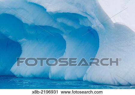 Repeating arch pattern in a glacial iceberg at Cierva Cove, Antarctica. View Large Photo Image Stock Image - Repeating arch pattern in a glacial iceberg at Cierva Cove, Antarctica.. Fotosearch