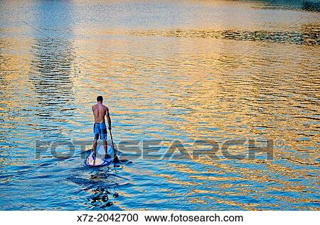 Riding the Stand Up Paddle Board at Shoshone Falls on the Snake River in the Snake River Canyon near the city of Twin Falls in southern Idaho. View Large Photo Image Stock Image - Riding the Stand Up Paddle Board at Shoshone Falls on the Snake River in the Snake River Canyon near the city of Twin Falls in southern Idaho.. Fotosearch