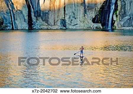 Riding the Stand Up Paddle Board at Shoshone Falls on the Snake River in the Snake River Canyon near the city of Twin Falls in southern Idaho. View Large Photo Image Stock Image - Riding the Stand Up Paddle Board at Shoshone Falls on the Snake River in the Snake River Canyon near the city of Twin Falls in southern Idaho.. Fotosearch