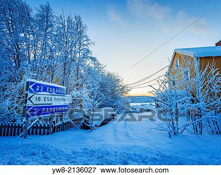 Road signs in snow covered landscape. Extreme cold temperatures, Jukkasjarvi, Lapland, Sweden. View Large Photo Image Stock Photo - Road signs in snow covered landscape. Extreme cold temperatures, Jukkasjarvi, Lapland, Sweden.. Fotosearch