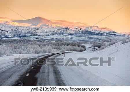 Road with frozen landscape, extreme cold temperatures Lapland, Sweden. View Large Photo Image Stock Photo - Road with frozen landscape, extreme cold temperatures Lapland, Sweden.. Fotosearch