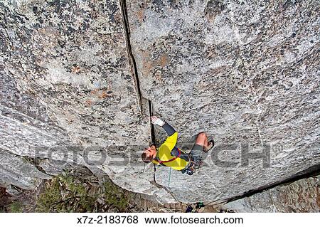 Rock climbing a route called Bloody Fingers which is rated 5, 10 and located on Super Hits Wall at the City Of Rocks National Reserve near the town of Almo in southern Idaho. View Large Photo Image Stock Photo - Rock climbing a route called Bloody Fingers which is rated 5, 10 and located on Super Hits Wall at the City Of Rocks National Reserve near the town of Almo in southern Idaho.. Fotosearch