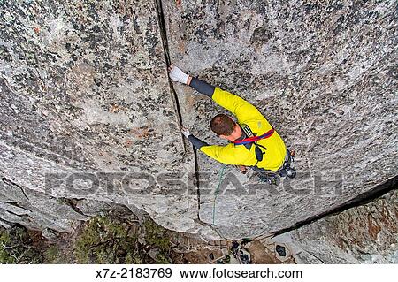 Rock climbing a route called Bloody Fingers which is rated 5, 10 and located on Super Hits Wall at the City Of Rocks National Reserve near the town of Almo in southern Idaho. View Large Photo Image Stock Photo - Rock climbing a route called Bloody Fingers which is rated 5, 10 and located on Super Hits Wall at the City Of Rocks National Reserve near the town of Almo in southern Idaho.. Fotosearch