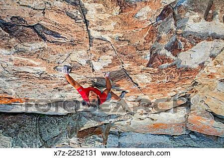 Rock climbing a route called Shes The Bosch which is rated 5, 11 and located on Window Rock at the City Of Rocks National Reserve near the town of Almo in southern Idaho. View Large Photo Image Stock Image - Rock climbing a route called Shes The Bosch which is rated 5, 11 and located on Window Rock at the City Of Rocks National Reserve near the town of Almo in southern Idaho.. Fotosearch