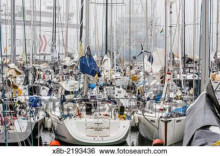 Stock Photograph - Sailboats fill the small harbor in the capital town of Visby, Gotland Island, Sweden.. Fotosearch