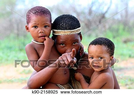 San mother with her kids pointing at the camera, Namibia, Africa. View Large Photo Image Stock Photography - San mother with her kids pointing at the camera, Namibia, Africa.. Fotosearch