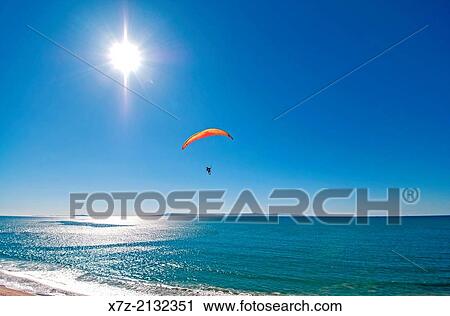 Santa Barbara, Paragliding over the Pacific Ocean near Rincon Beach Park and the Carpinteria Bluffs near the city of Carpinteria in southern California. View Large Photo Image Stock Image - Santa Barbara, Paragliding over the Pacific Ocean near Rincon Beach Park and the Carpinteria Bluffs near the city of Carpinteria in southern California.. Fotosearch
