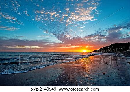 Santa Barbara, Sunset over the Pacific Ocean at Arroyo Hondo Beach near the city of Goleta in southern California. View Large Photo Image Stock Photo - Santa Barbara, Sunset over the Pacific Ocean at Arroyo Hondo Beach near the city of Goleta in southern California.. Fotosearch