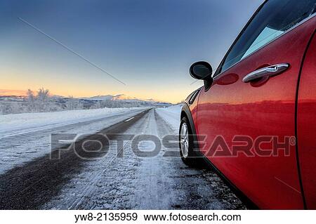 Side of red car on road, Lapland, Sweden. View Large Photo Image Stock Photo - Side of red car on road, Lapland, Sweden.. Fotosearch
