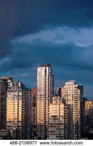 skyline condo towers at sunset on the north shore of False Creek, Vancouver, BC, Canada. View Large Photo Image Stock Photo - skyline condo towers at sunset on the north shore of False Creek, Vancouver, BC, Canada.. Fotosearch