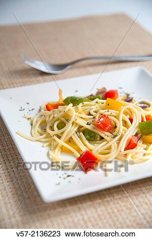 Spaghetti with peppers, close view. View Large Photo Image Stock Image - Spaghetti with peppers, close view.. Fotosearch
